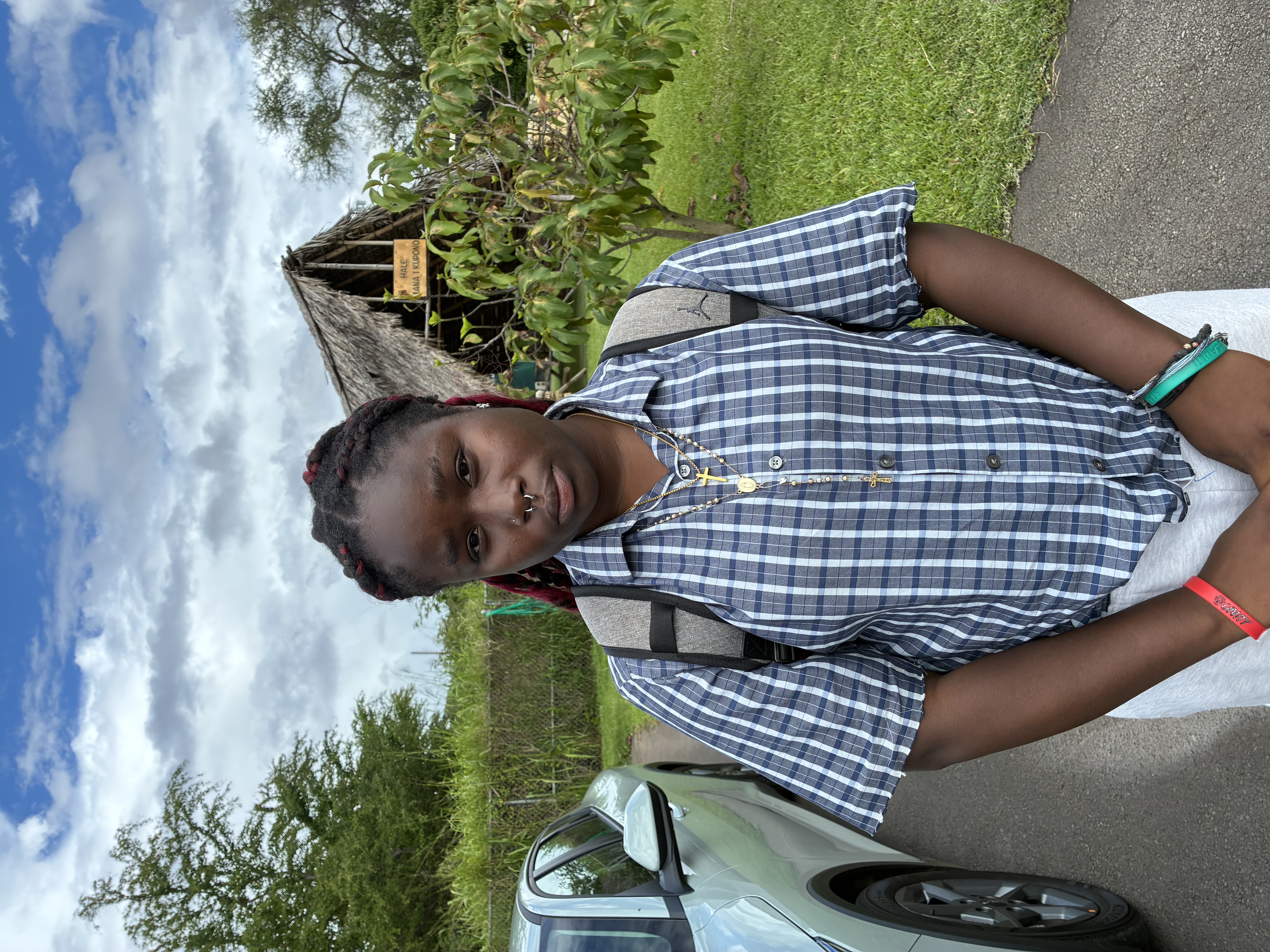 Missing Children: Grace Carama, eyes color Brown, hair color Black w/red braids, weight 183pounds, height 5feet 2inches, 